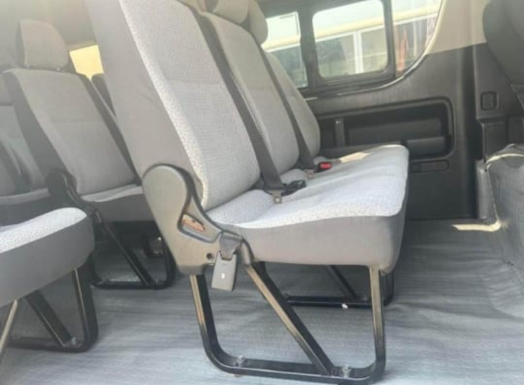 Actual gray passenger seats inside the SwiftRide van